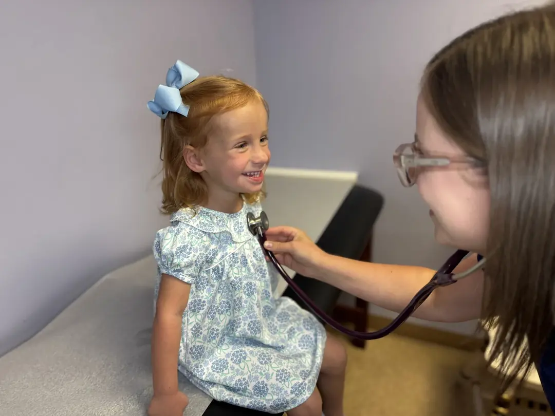 A Preferred Pediatrics provider caring for a young patient during an office visit